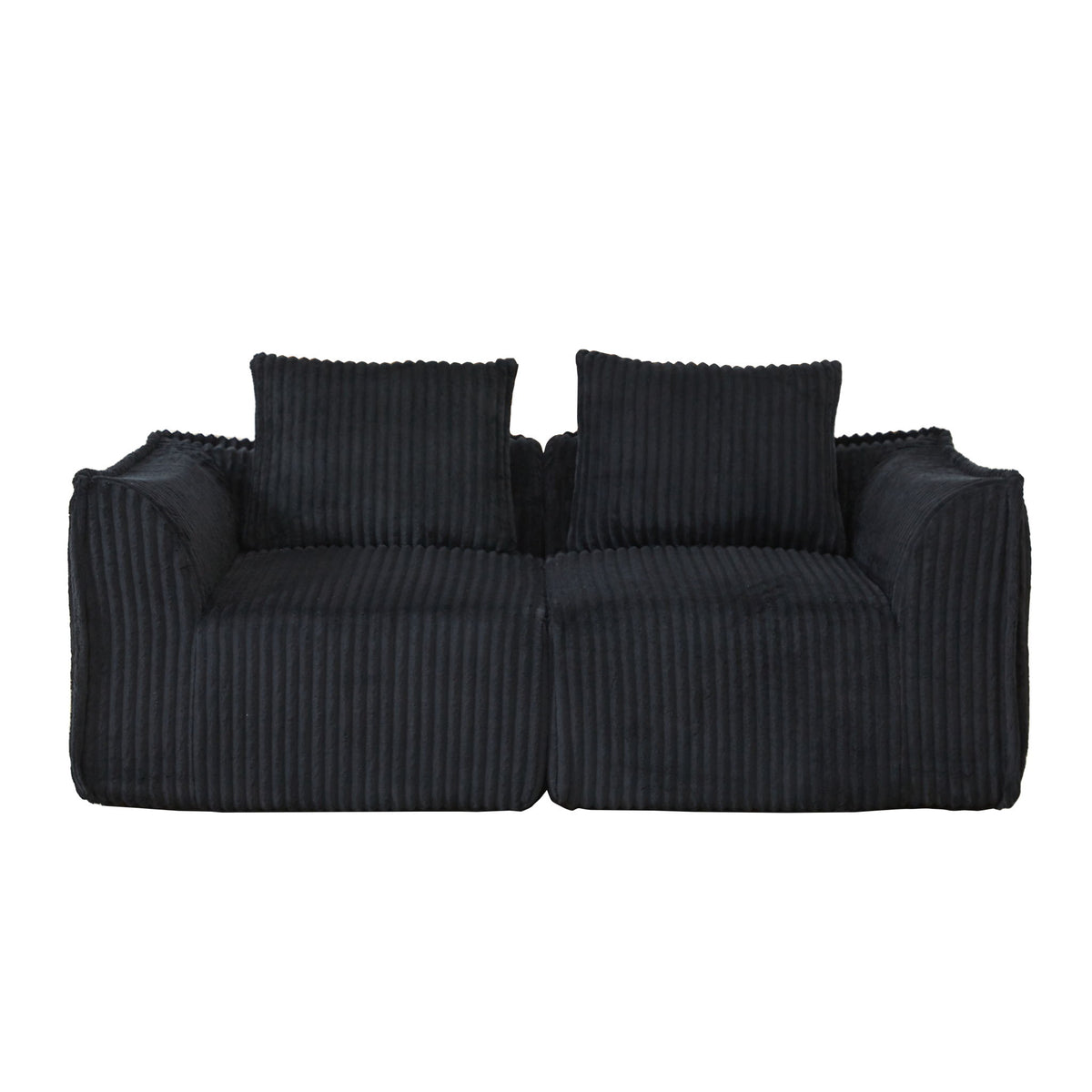Minimalist Sofa With Curved Lines And Horn Shaped Throw Pillows