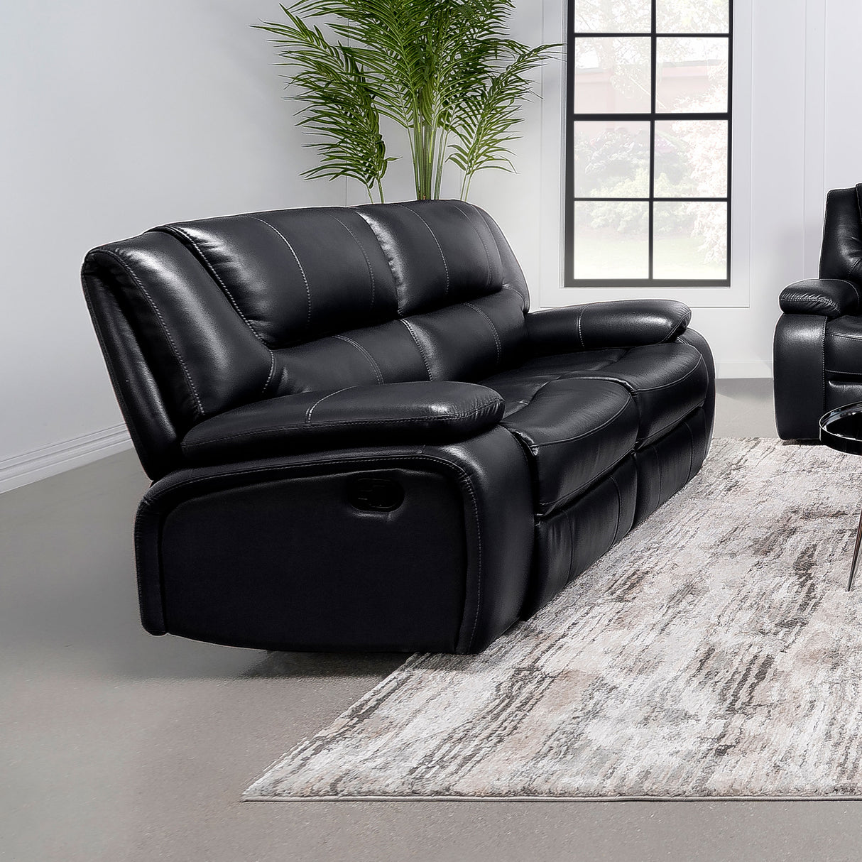 Camila Upholstered Motion Reclining Loveseat in Black