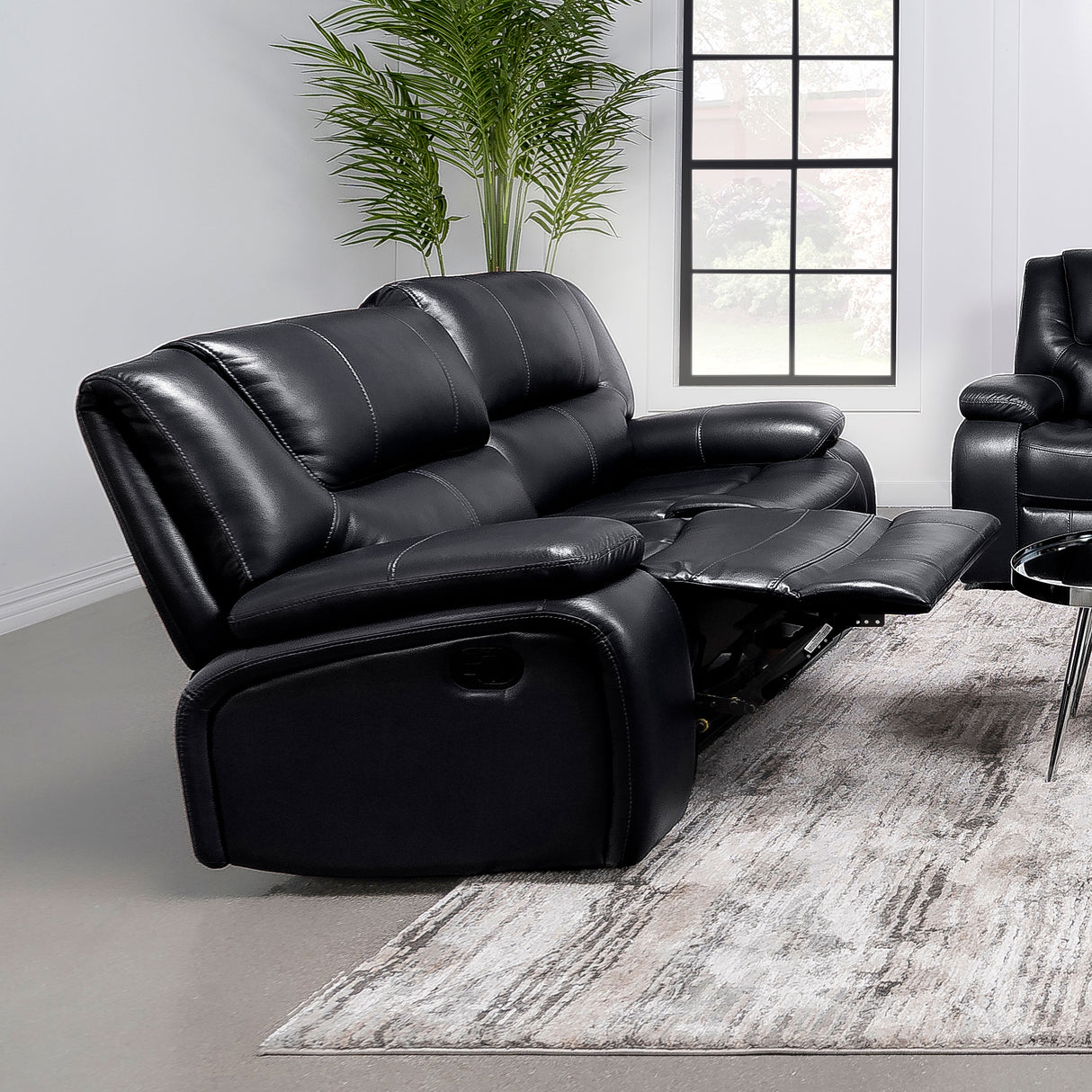 Camila Upholstered Motion Reclining Loveseat in Black