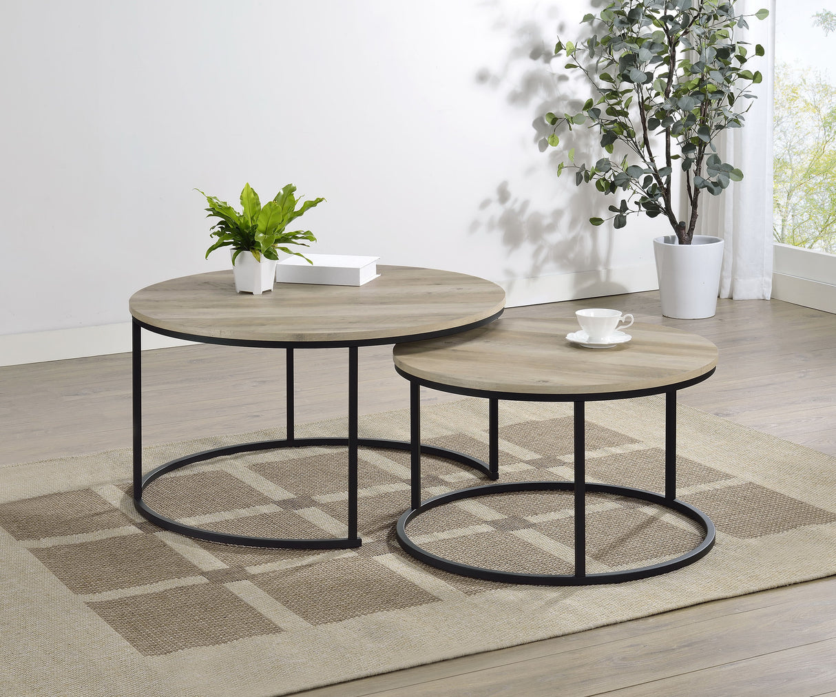 Lainey 2-Piece Round Nesting Coffee Table in Distressed Pine