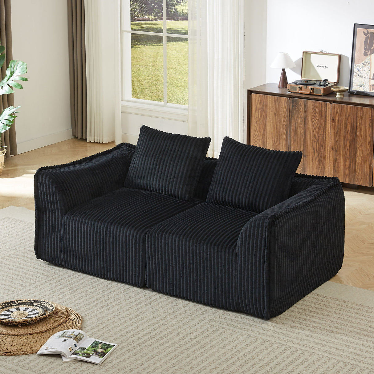 Minimalist Sofa With Curved Lines And Horn Shaped Throw Pillows