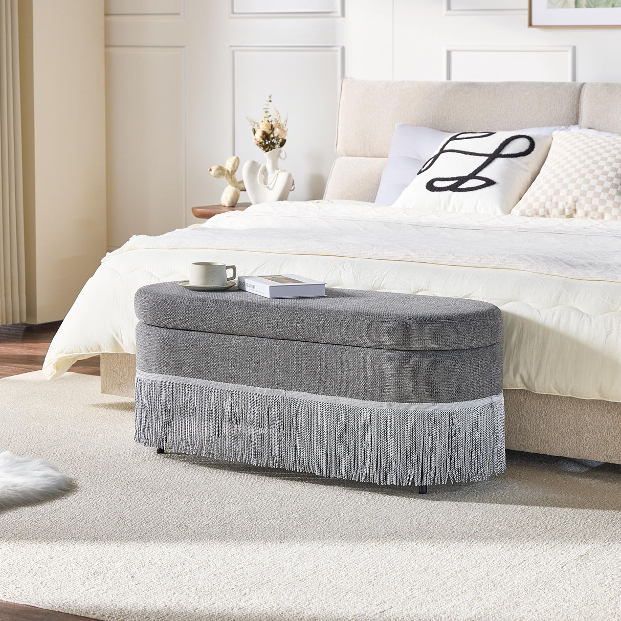 Oval Upholstered Storage Ottoman With Fringe Trim & Lift Top Lid