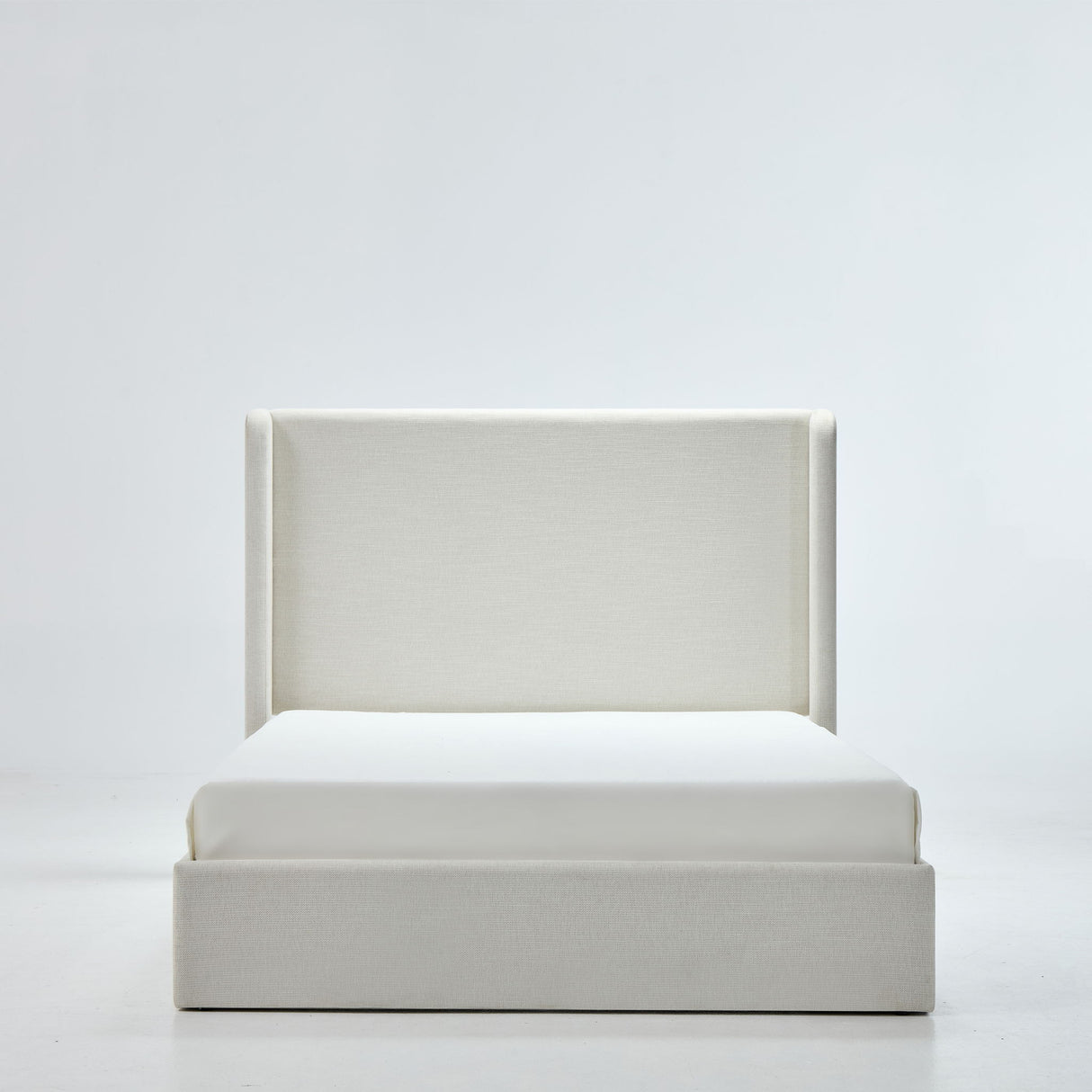 Caron - Upholstered Wingback Bed With High Headboard