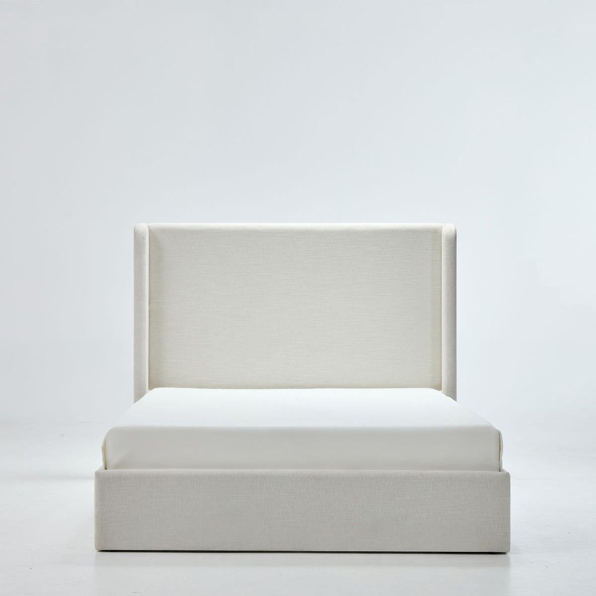 Caron - King Size Upholstered Wingback Bed With High Headboard - Ivory