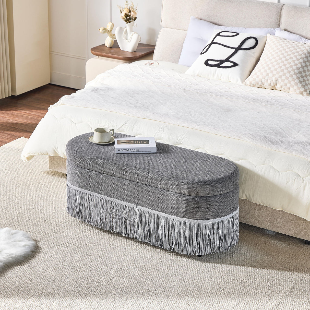 Oval Upholstered Storage Ottoman With Fringe Trim & Lift Top Lid