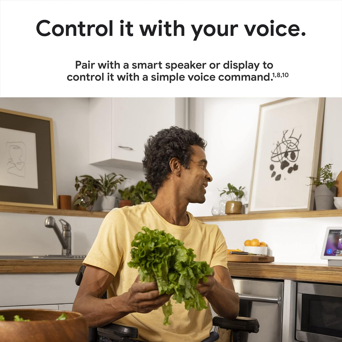 Nest Cam indoor wired camera voice control through a compatible smart speaker or display, sold separately