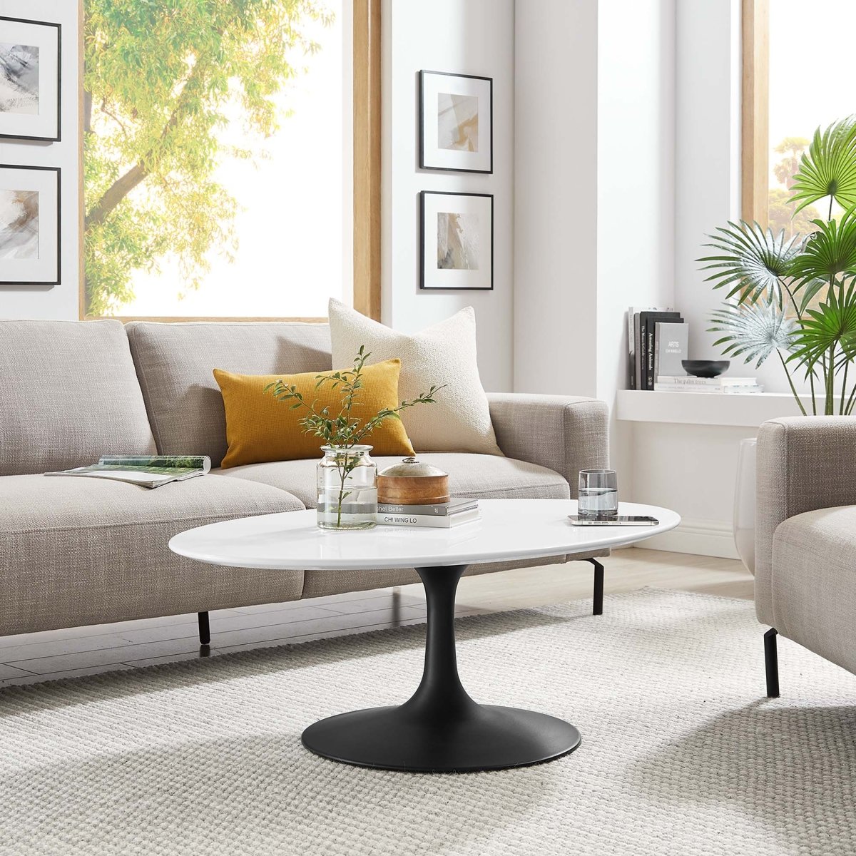 Oval Wood Pedestal Coffee Table - Coffee Tables available at Alpine Outlets in Denver