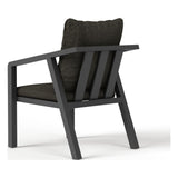 Angled view of a Monarch outdoor dining chair in Charcoal