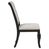 Phelps 9-Piece Dining Set, Distressed Noir with Tan Upholstery