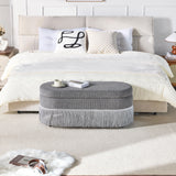 Oval Upholstered Storage Ottoman With Fringe Trim & Lift Top Lid
