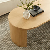 47 Inch Oval Wood Coffee Table with Reversible Arched Legs in Oak - Coffee Tables available at Alpine Outlets in Denver