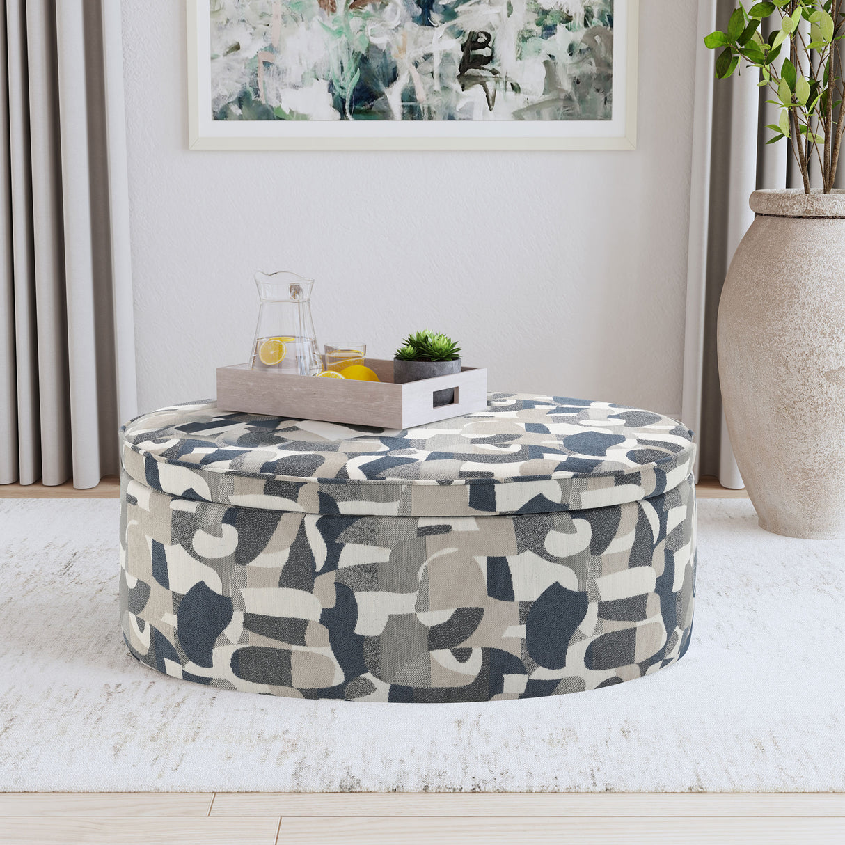 Tomkins Oval Upholstered Storage Ottoman, Indigo Blue
