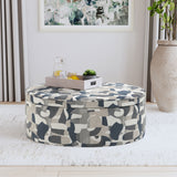Tomkins Oval Upholstered Storage Ottoman, Indigo Blue