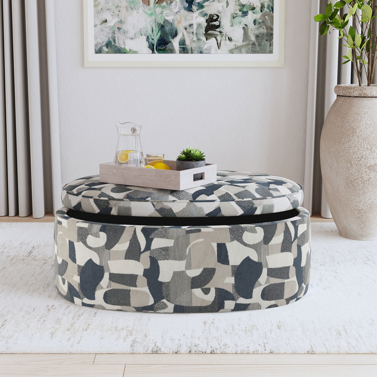 Tomkins Oval Upholstered Storage Ottoman, Indigo Blue