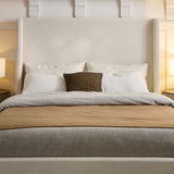 Caron - King Size Upholstered Wingback Bed With High Headboard - Ivory