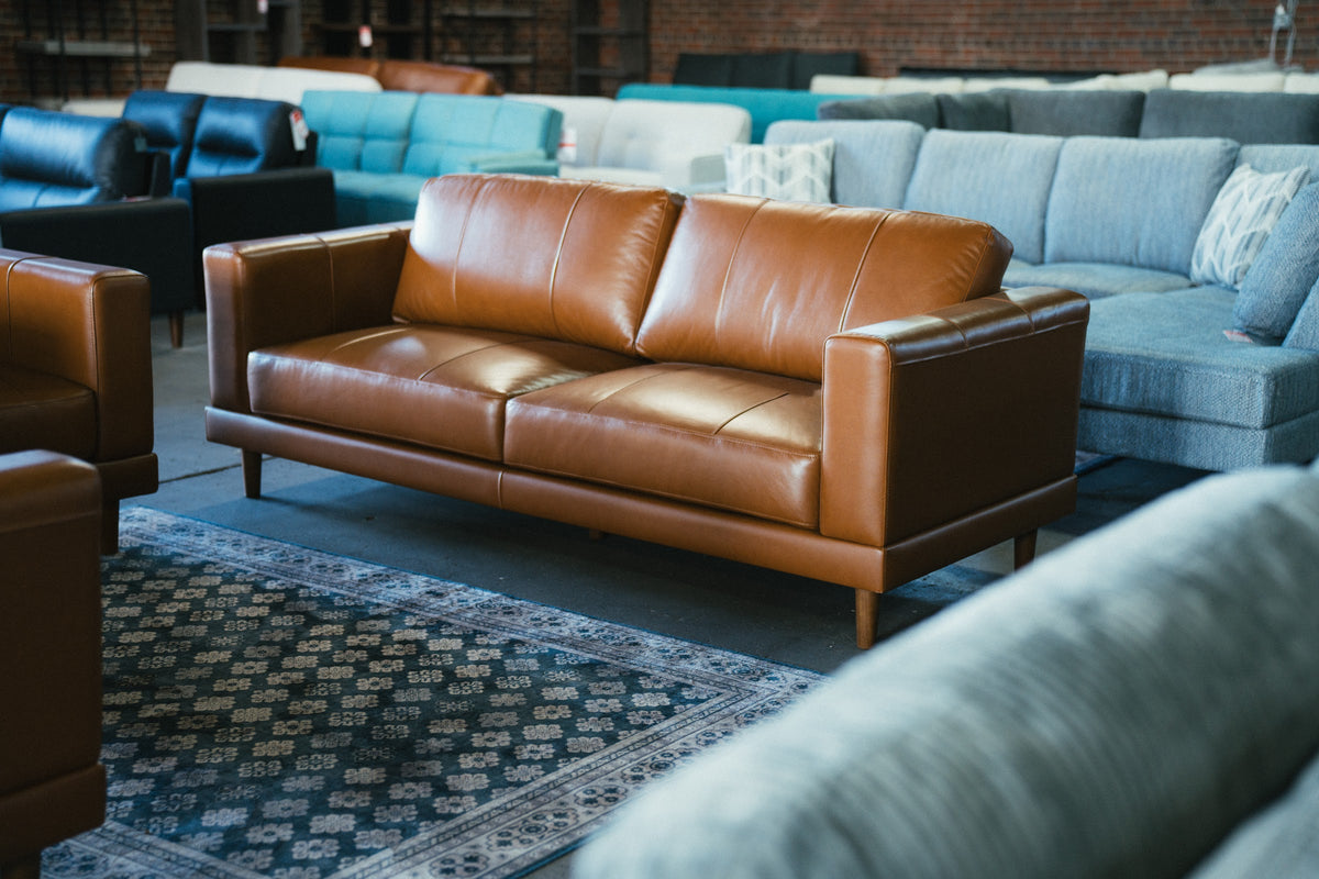Leather sofa on the showroom floor at Alpine Outlets Denver