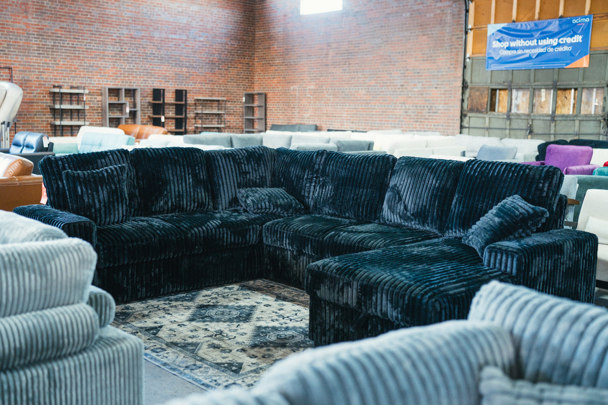 Sectional sofas on the showroom floor at Alpine Outlets Denver
