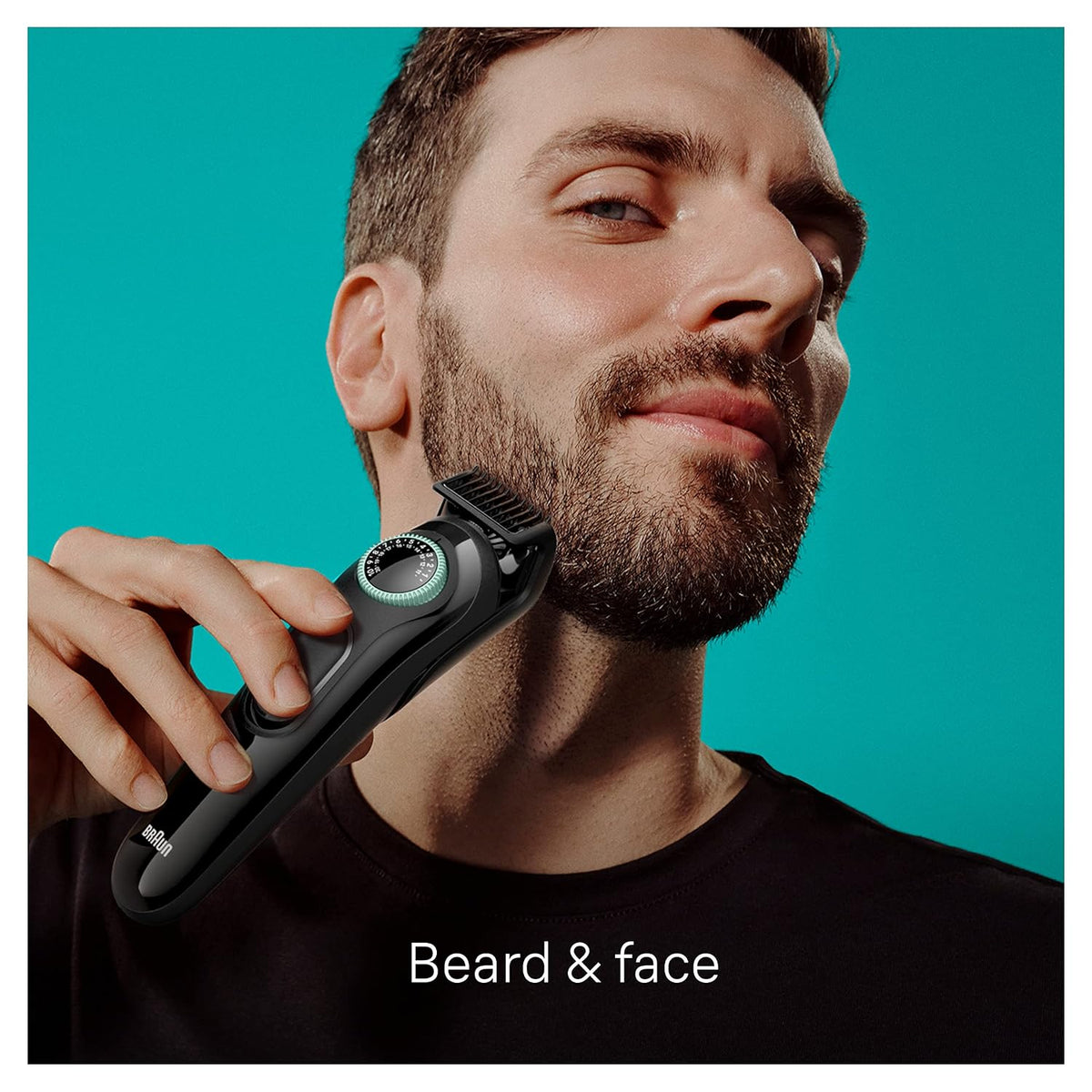 Braun AIO3430 beard trimmer in use with adjustable comb