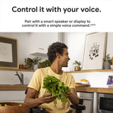 Nest Cam indoor wired camera voice control through a compatible smart speaker or display, sold separately