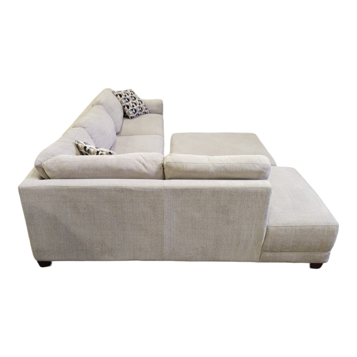 Raylin Fabric Sectional with Ottoman - available at Alpine Outlets in Denver