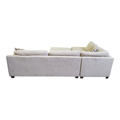 Raylin Fabric Sectional with Ottoman - available at Alpine Outlets in Denver