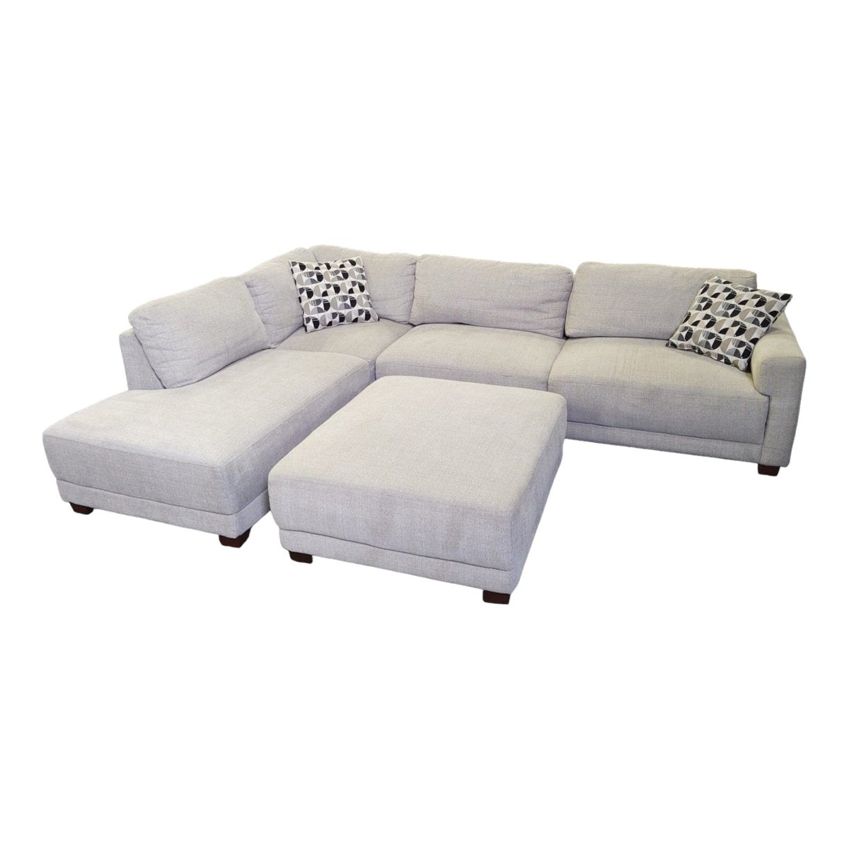 Raylin Fabric Sectional with Ottoman - available at Alpine Outlets in Denver