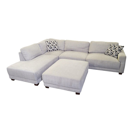 Raylin Fabric Sectional with Ottoman - Alpine Outlets